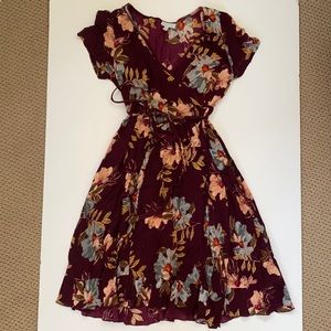 patrons of peace midi length wrap dress